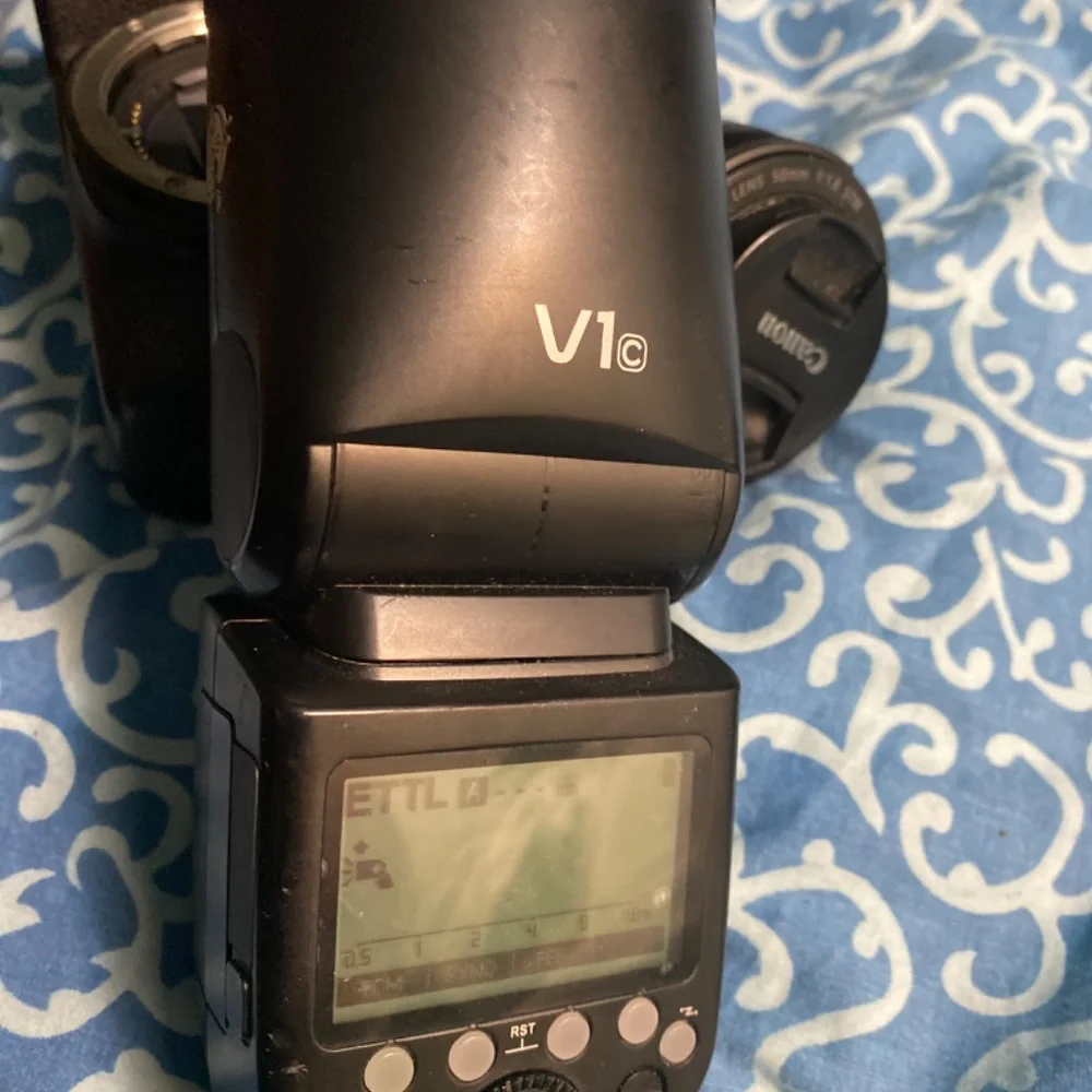 Canon T7i, Canon 50mm lens, Godax V1c flash